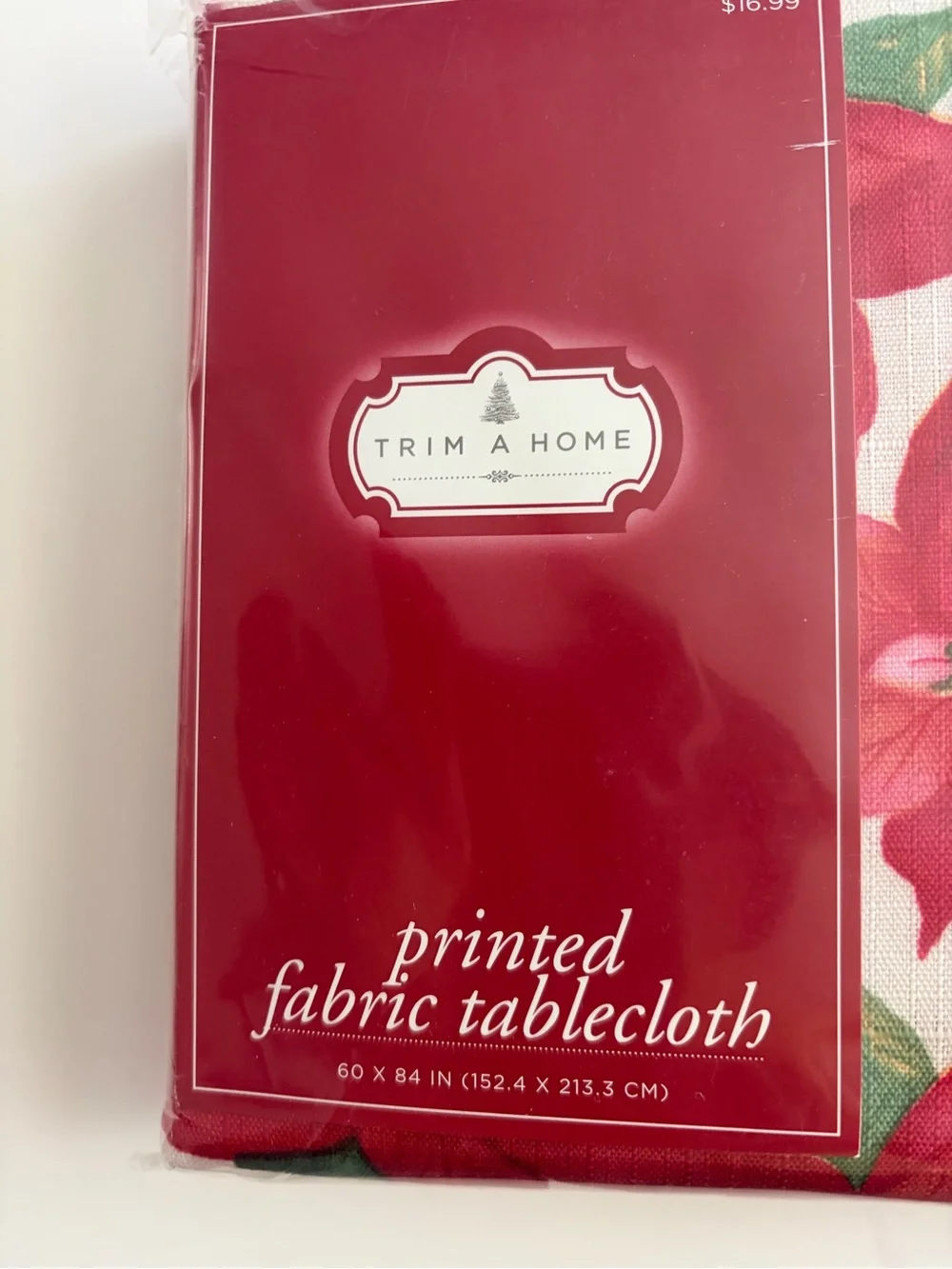 NWT Christmas print fabric tablecloth. 60x84 oblong. Original packaging